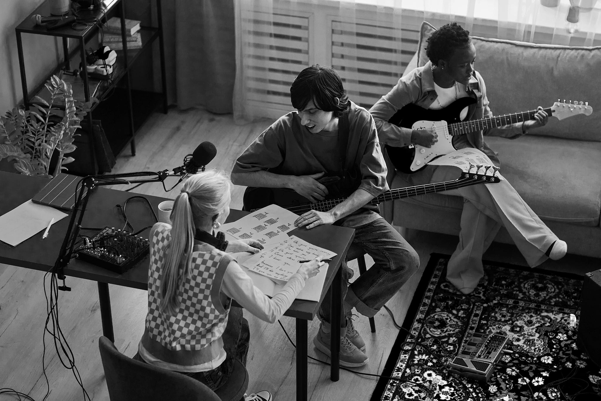 Musicians working in studio